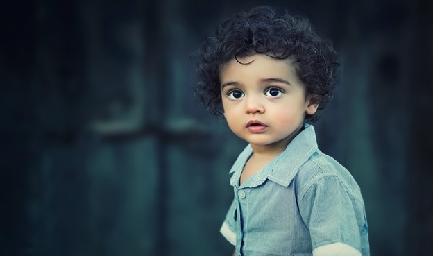 Low key photo of a boy