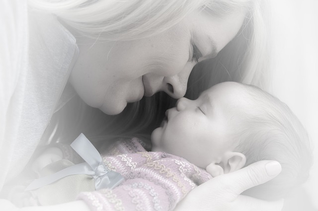 newborn baby and mother